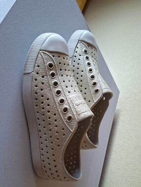Native Women's Glitter Slip-On Sneakers in Champagne Metallic